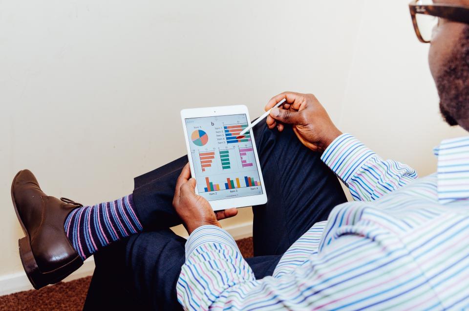 Investors negotiating a transaction across a boardroom table